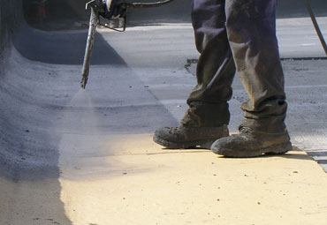 Coating systems over Chandler spray foam roof systems