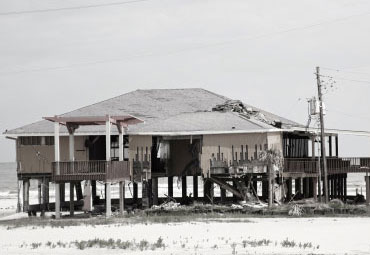 Wind damage - spray foam can help prevent uplift to Chandler roofs